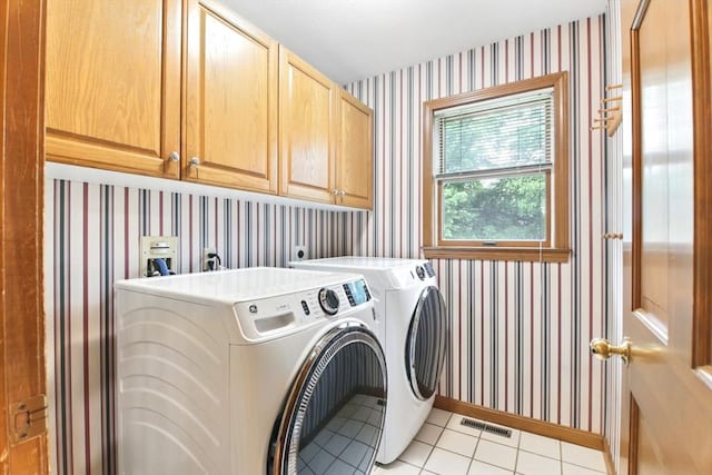 36 Apple Ridge Rd, West Springfield, MA 01089 - washroom with wallpapered walls, cabinet space, independent washer and dryer, light tile patterned floors, and baseboards