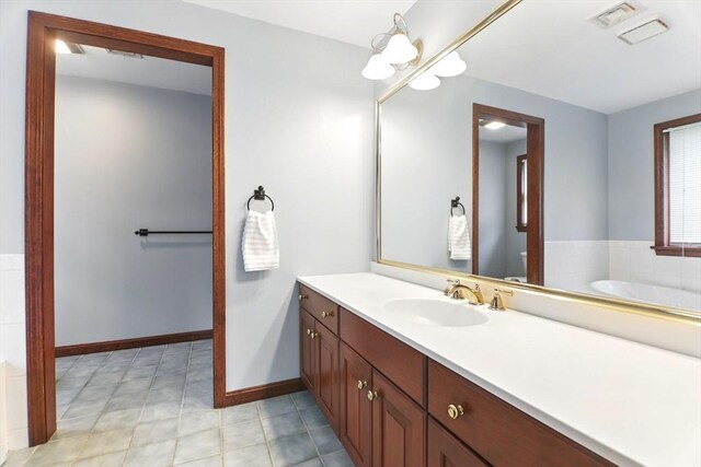 36 Apple Ridge Rd, West Springfield, MA 01089 - bathroom with vanity, a garden tub, and baseboards