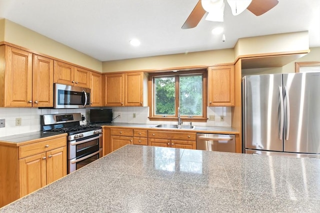 36 Apple Ridge Rd, West Springfield, MA 01089 - kitchen featuring stainless steel appliances, a sink, ceiling fan, decorative backsplash, and recessed lighting