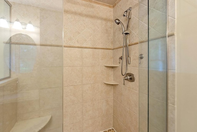 full bathroom featuring a tile shower