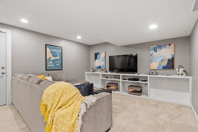 living area featuring carpet flooring and recessed lighting