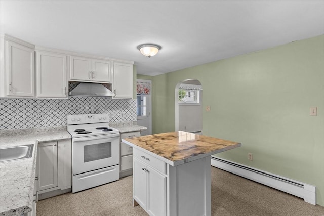 7 Burgess St, Methuen, MA 01844 - kitchen with white electric stove, a baseboard heating unit, under cabinet range hood, arched walkways, and white cabinets