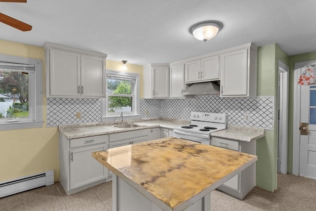 7 Burgess St, Methuen, MA 01844 - kitchen featuring extractor fan, white range with electric stovetop, a baseboard heating unit, and decorative backsplash