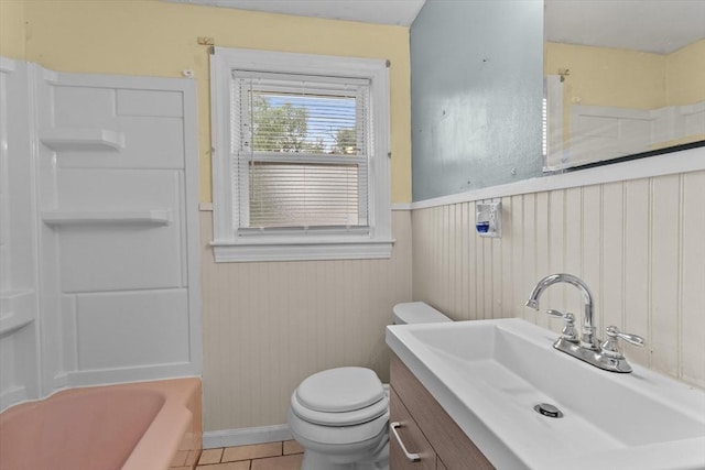 7 Burgess St, Methuen, MA 01844 - full bath with a wainscoted wall, vanity, and tile patterned floors