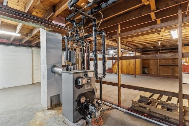 7 Burgess St, Methuen, MA 01844 - unfinished below grade area with a heating unit