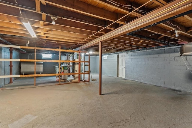 7 Burgess St, Methuen, MA 01844 - unfinished below grade area featuring oil tank and a heating unit