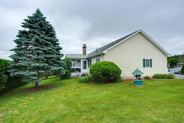 7 Chandler Way Unit 7, Northborough, MA 01532 - back of house featuring a chimney, a lawn, and a sunroom