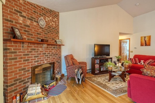 7 Chandler Way Unit 7, Northborough, MA 01532 - living room with wood finished floors, a fireplace, and high vaulted ceiling