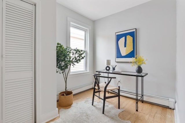 39 Calvin St Unit 3, Somerville, MA 02143 - home office with a baseboard radiator and wood finished floors