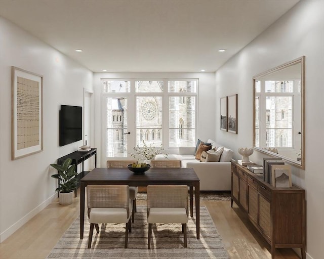 interior space with light wood-style floors, recessed lighting, and baseboards