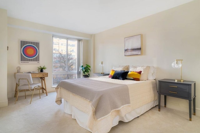 bedroom with light carpet