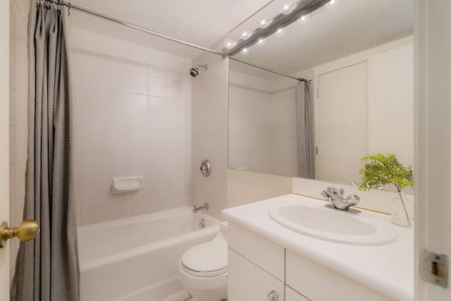 full bathroom featuring shower / bath combo with shower curtain, vanity, and toilet