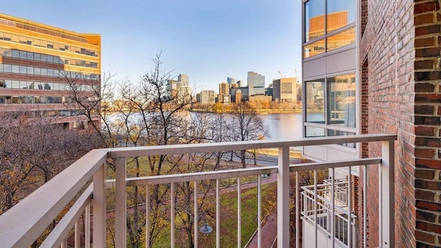 balcony featuring a water view