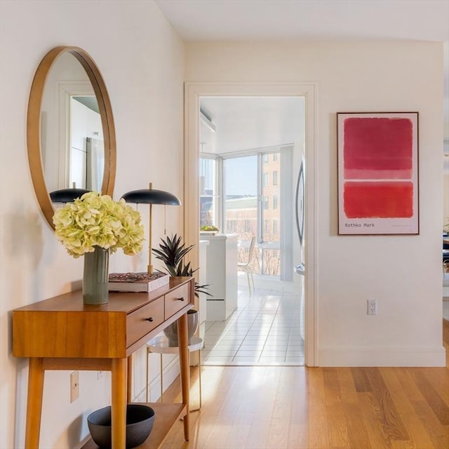 corridor featuring light hardwood / wood-style flooring