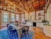 dining area featuring vaulted ceiling with beams and wood ceiling