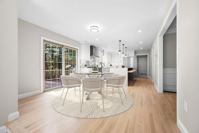 46 Mansfield Ave, Norton, MA 02766 - dining area with baseboards and light wood-type flooring