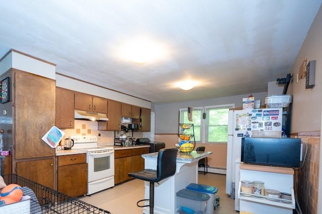 60 High Ridge Rd, Worcester, MA 01602 - kitchen featuring white electric stove, under cabinet range hood, brown cabinetry, light countertops, and a baseboard heating unit