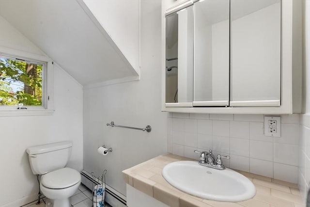 956 Bay Rd Unit 1, Hamilton, MA 01982 - half bath with a sink, toilet, tasteful backsplash, lofted ceiling, and a baseboard radiator
