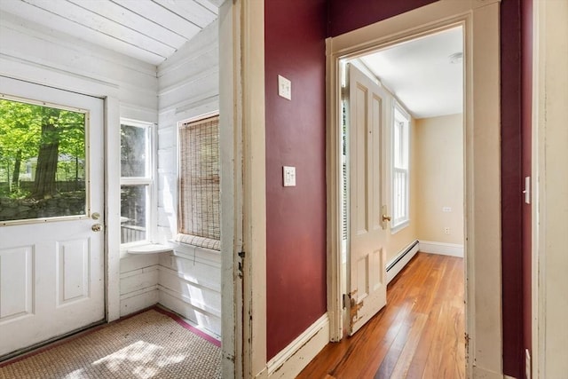 956 Bay Rd Unit 1, Hamilton, MA 01982 - entryway with a baseboard heating unit, plenty of natural light, hardwood / wood-style floors, and lofted ceiling