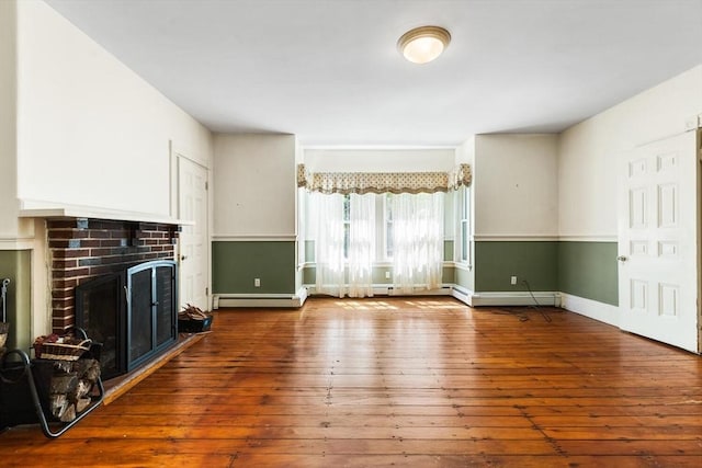 956 Bay Rd Unit 1, Hamilton, MA 01982 - unfurnished living room with wood-type flooring, a fireplace, baseboard heating, and baseboards
