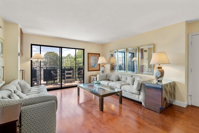 990 Massachusetts Ave Unit A37, Arlington, MA 02476 - living room with wood finished floors and baseboards