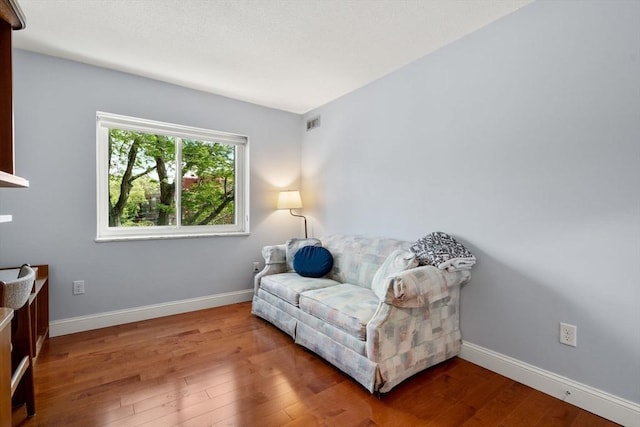 990 Massachusetts Ave Unit A37, Arlington, MA 02476 - sitting room with wood finished floors