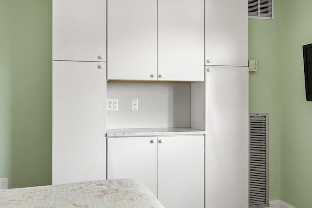 990 Massachusetts Ave Unit A37, Arlington, MA 02476 - kitchen with light countertops and white cabinetry