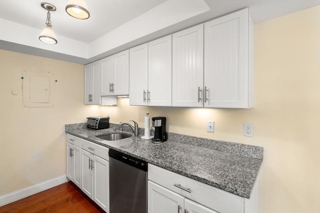 990 Massachusetts Ave Unit A37, Arlington, MA 02476 - kitchen with stainless steel dishwasher, white cabinetry, dark stone counters, and dark wood-style floors