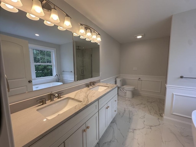 58 Dudley Rd, Billerica, MA 01821 - full bath with a bath, double vanity, a stall shower, marble finish floors, and wainscoting