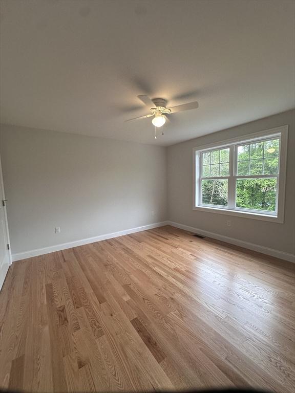 58 Dudley Rd, Billerica, MA 01821 - unfurnished room with light wood-type flooring, baseboards, and a ceiling fan