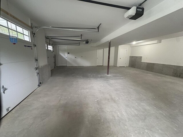 58 Dudley Rd, Billerica, MA 01821 - garage featuring a garage door opener