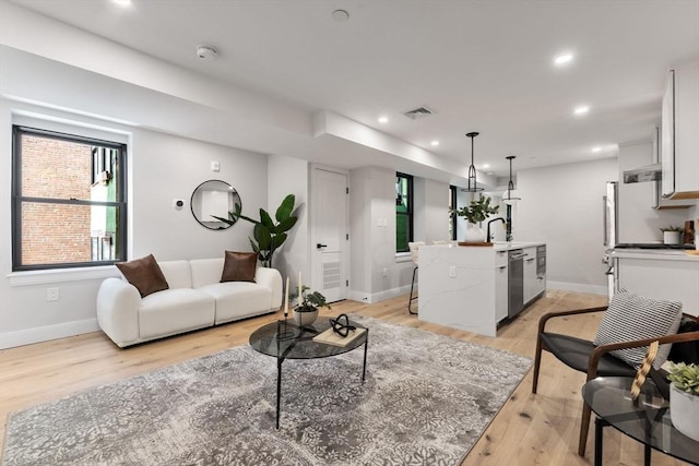 190 Salem St Unit 2, Boston, MA 02113 - living room with baseboards, light wood-type flooring, and recessed lighting