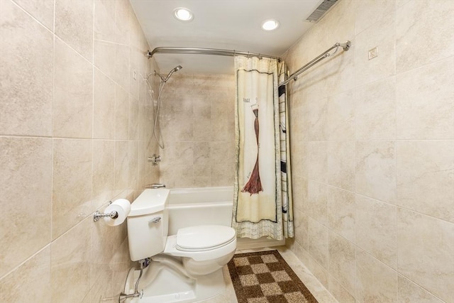 bathroom with visible vents, toilet, shower / bath combination with curtain, tile walls, and recessed lighting