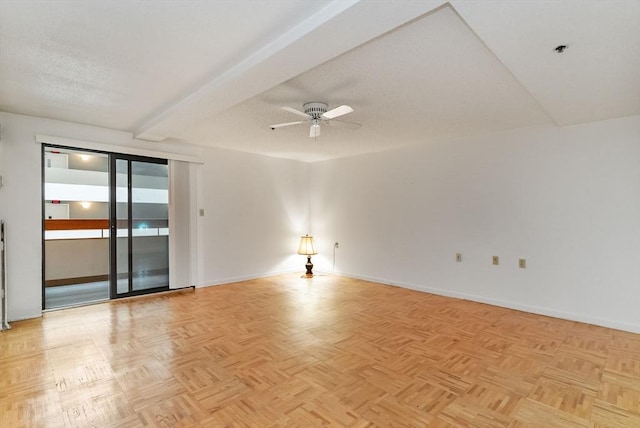 357 Commercial St Unit 219, Boston, MA 02109 - unfurnished room featuring a ceiling fan, fire sprinkler in ceiling, baseboards, and beamed ceiling
