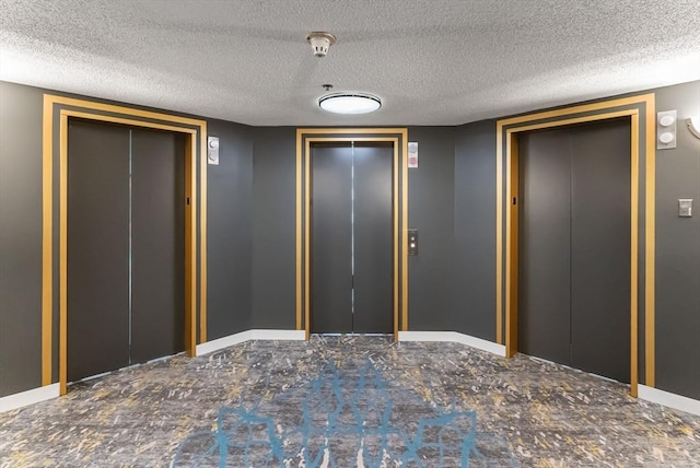 357 Commercial St Unit 219, Boston, MA 02109 - interior space featuring elevator, baseboards, and a textured ceiling
