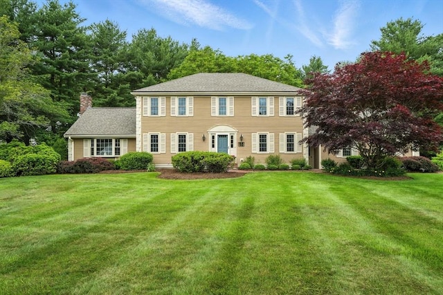 56 R F Higgins Dr, Norwell, MA 02061 - colonial house with a chimney and a front lawn