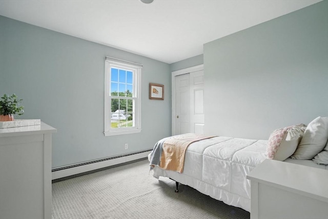 56 R F Higgins Dr, Norwell, MA 02061 - bedroom featuring a baseboard radiator, carpet flooring, and a closet
