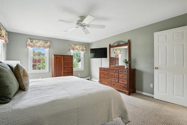 56 R F Higgins Dr, Norwell, MA 02061 - carpeted bedroom featuring baseboard heating and ceiling fan