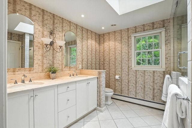 56 R F Higgins Dr, Norwell, MA 02061 - bathroom featuring baseboard heating, plenty of natural light, a skylight, tile patterned flooring, and recessed lighting