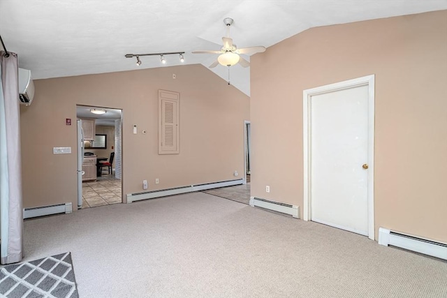 interior space with a baseboard radiator, light carpet, and lofted ceiling