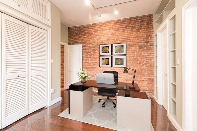 15 Blackwood Unit 2, Boston, MA 02115 - office area featuring brick wall, built in features, rail lighting, wood finished floors, and baseboards