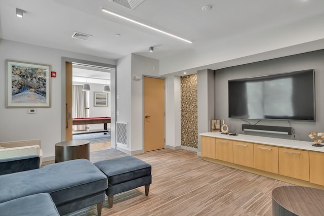 living room featuring light wood-type flooring