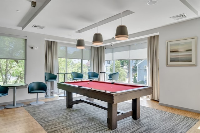 recreation room with hardwood / wood-style flooring and pool table