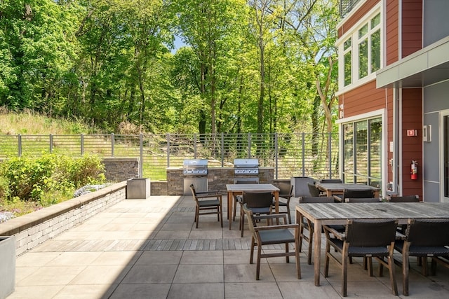 view of patio with a grill