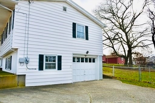 view of home's exterior featuring a garage