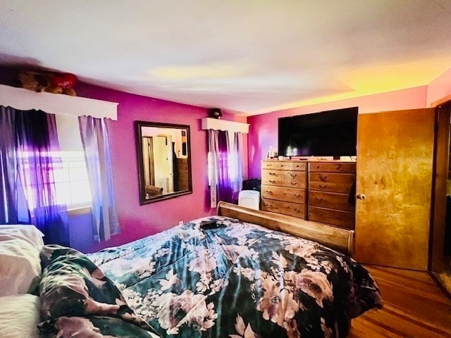 bedroom featuring hardwood / wood-style flooring