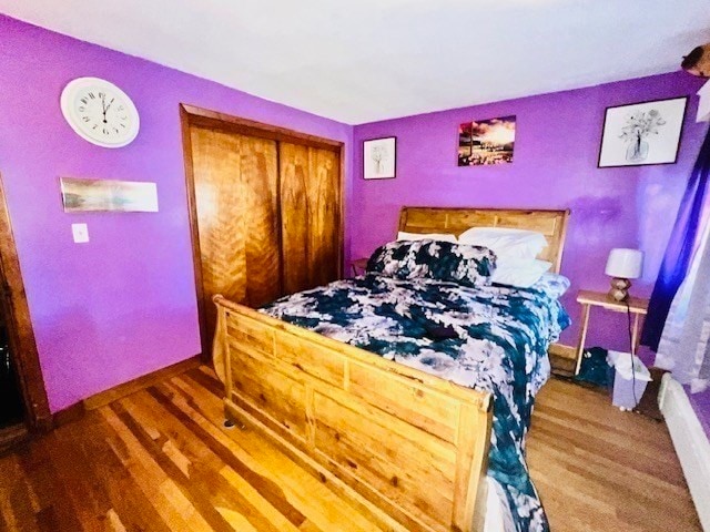 bedroom featuring hardwood / wood-style floors