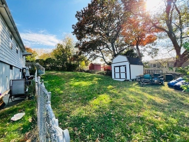 view of yard with a shed