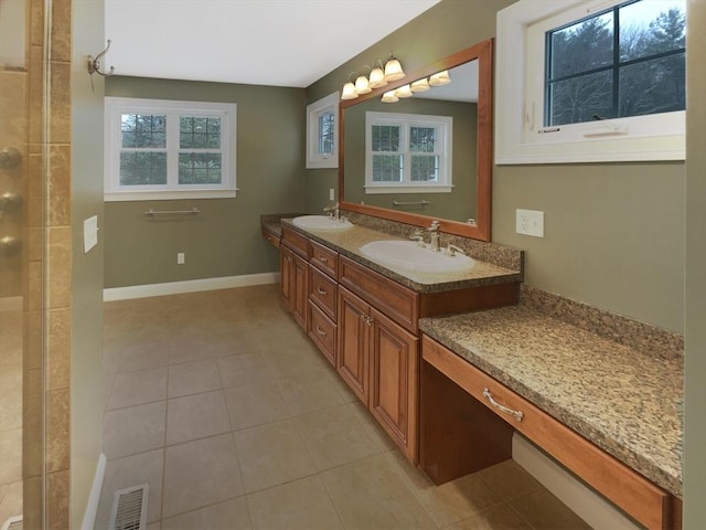 bathroom featuring vanity and tile patterned flooring