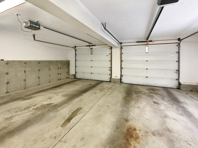 garage featuring a garage door opener